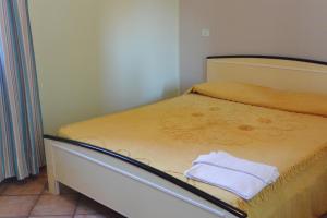 Posteľ alebo postele v izbe v ubytovaní Albergo Escondido