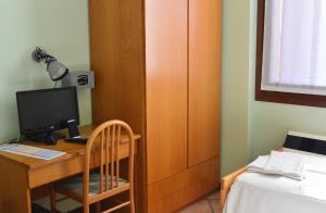 Posteľ alebo postele v izbe v ubytovaní Albergo Escondido