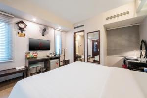 Televiisor ja/või meelelahutuskeskus majutusasutuses A25 Hotel - 88 Nguyễn Khuyến