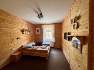 Postel nebo postele na pokoji v ubytování Penzion U Malířských + 7 fotografií