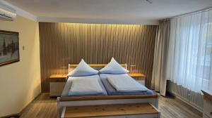 Postel nebo postele na pokoji v ubytování Hotel Stadt Soest