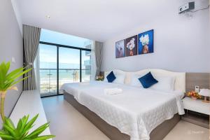 Ένα ή περισσότερα κρεβάτια σε δωμάτιο στο Dory Apartment - CSJ Tower Vũng Tàu, Pool, Ocean View, Central Location +64 φωτογραφίες