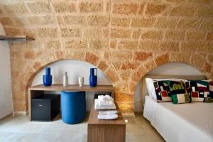 Postel nebo postele na pokoji v ubytování Monachile Suite & Room - Housea