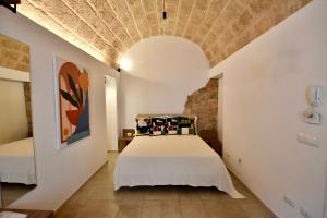 Postel nebo postele na pokoji v ubytování Monachile Suite & Room - Housea