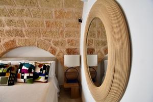 Postel nebo postele na pokoji v ubytování Monachile Suite & Room - Housea