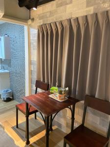 Posezení v ubytování 內之島旅宿 House + 37 fotografií
