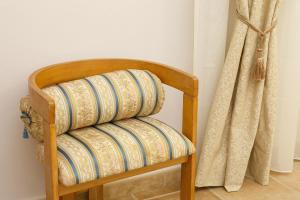 A bed or beds in a room at Torretta d'Assisi