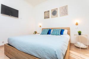 Civico 1 Apt - Acireale客房内的一张或多张床位