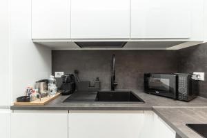 O bucătărie sau chicinetă la Torre Cantore Suite