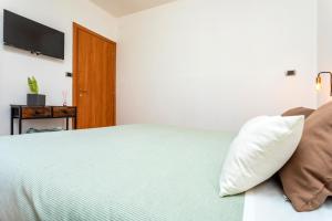 Civico 1 Apt - Acireale客房内的一张或多张床位