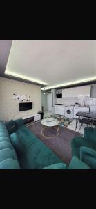Η κουζίνα ή μικρή κουζίνα στο 50 yıl SUIT APART RESIDANCE