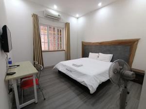 Postel nebo postele na pokoji v ubytování Resort HTC Tuần Châu