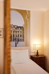 Posteľ alebo postele v izbe v ubytovaní Hotel Royal