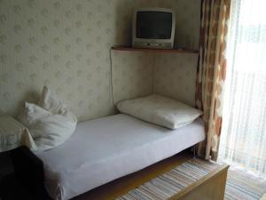 Letto o letti in una camera di Gästehaus Jedinger