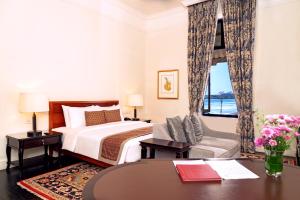 Postel nebo postele na pokoji v ubytování Galle Face Hotel
