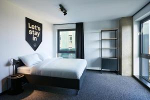 The Social Hub Glasgow客房内的一张或多张床位