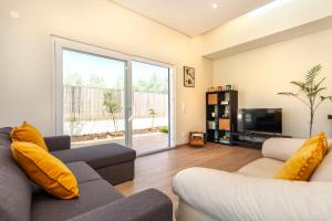 TV a/nebo společenská místnost v ubytování Villa Harmony by Algarve Vacation