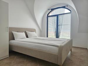 Ένα ή περισσότερα κρεβάτια σε δωμάτιο στο MAGNOLIA Apartments +46 φωτογραφίες