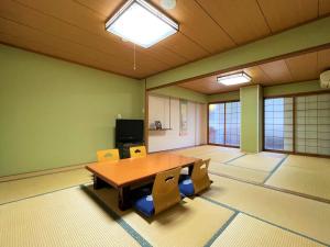 TV a/nebo společenská místnost v ubytování Dochu Land Shin Onsen