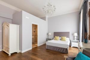 Posteľ alebo postele v izbe v ubytovaní Spagna Art & Suites - CA Domus Collection
