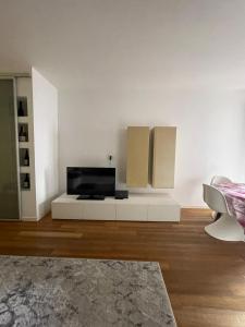 TV a/nebo společenská místnost v ubytování Lo Zodiaco COZY Apartment in Oderzo