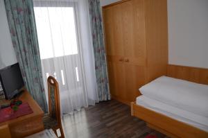 Postel nebo postele na pokoji v ubytování Gästehaus Klug