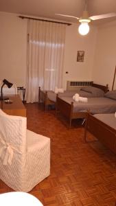 Postel nebo postele na pokoji v ubytování Locanda El Piron