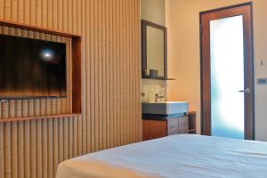 TV a/nebo společenská místnost v ubytování 嬉安平 Si Anping by Hotel Si