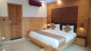 Postel nebo postele na pokoji v ubytování Hotel Skyking