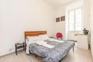 Voodi või voodid majutusasutuse San Pietro View Boutique Rooms toas