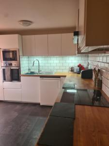Kuchyň nebo kuchyňský kout v ubytování Fir Tree Lodge + 23 fotografií