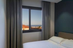 Posteľ alebo postele v izbe v ubytovaní Ollen apartments