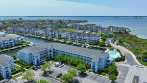 an aerial view of a city with condos and the water at Tranquil 2-Bedroom Condo in Hidden Bay Relax & Enjoy Bay Views in Ocean City