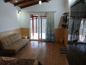 Et opholdsområde på Himdarshan view cottage