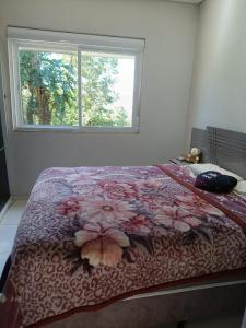Ένα ή περισσότερα κρεβάτια σε δωμάτιο στο Casa Ametista