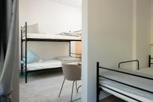 Postel nebo postele na pokoji v ubytování Alliance Hostel