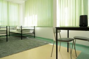 Postel nebo postele na pokoji v ubytování Alliance Hostel