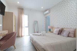 Postel nebo postele na pokoji v ubytování Residenze Miao
