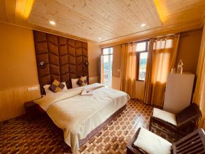 Postelja oz. postelje v sobi nastanitve La Voglia-Old Manali