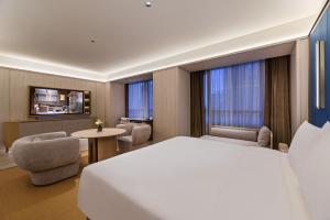 Μια τηλεόραση ή/και κέντρο ψυχαγωγίας στο Crystal Orange Shanghai Lujiazui Financial Center Hotel
