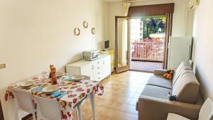 Posezení v ubytování CONDOMINIO TREVI