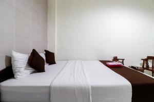 Katil atau katil-katil dalam bilik di Hotel Safara Yogyakarta