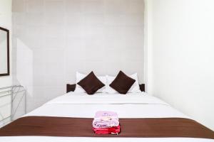 Katil atau katil-katil dalam bilik di Hotel Safara Yogyakarta