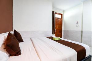 Katil atau katil-katil dalam bilik di Hotel Safara Yogyakarta