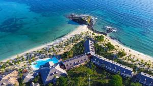 an aerial view of a beach and the ocean at VOI Andilana Beach Resort in Nosy Be