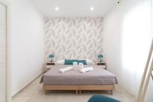 Postel nebo postele na pokoji v ubytování Residenze Miao + 35 fotografií