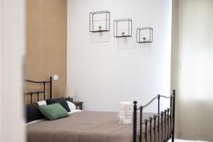 Postel nebo postele na pokoji v ubytování Residenze Miao