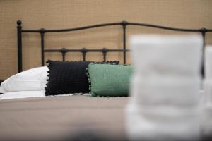 Postel nebo postele na pokoji v ubytování Residenze Miao