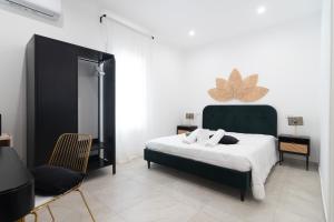 Postel nebo postele na pokoji v ubytování Residenze Miao