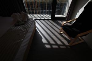 Rúm í herbergi á Bai Ji Yi B&B